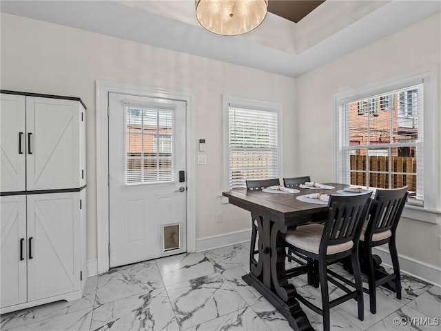 130 N Jefferson St, Petersburg, VA 23803 - dining room with light marble finish flooring and baseboards