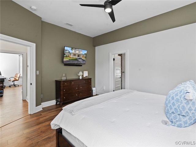 130 N Jefferson St, Petersburg, VA 23803 - bedroom with dark wood-style flooring and ceiling fan