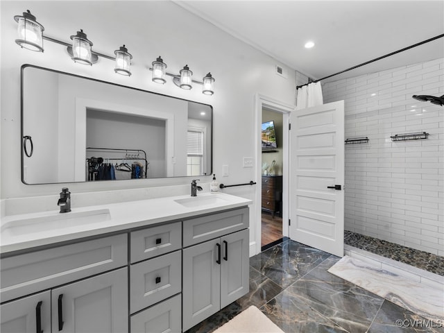 130 N Jefferson St, Petersburg, VA 23803 - full bath featuring marble tiled floors, tiled shower, double vanity, and recessed lighting
