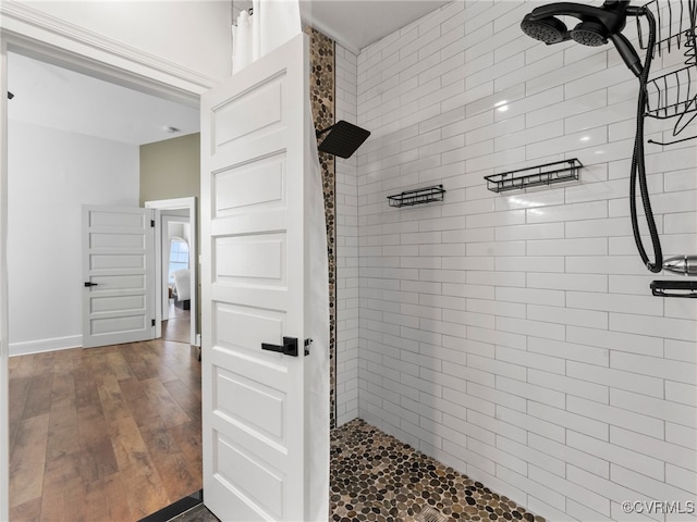 130 N Jefferson St, Petersburg, VA 23803 - full bathroom featuring a tile shower and hardwood / wood-style flooring