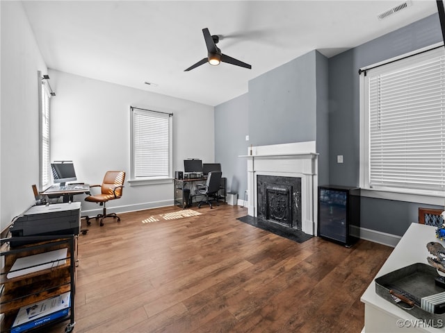 130 N Jefferson St, Petersburg, VA 23803 - office featuring beverage cooler, ceiling fan, wood finished floors, and a premium fireplace