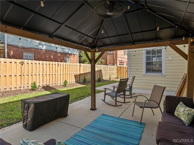 130 N Jefferson St, Petersburg, VA 23803 - fenced backyard with a gazebo, a patio, and ceiling fan