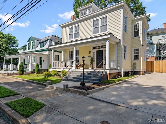 130 N Jefferson St, Petersburg, VA 23803 - traditional style home with covered porch and a chimney