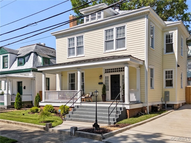 130 N Jefferson St, Petersburg, VA 23803 - american foursquare style home with a porch
