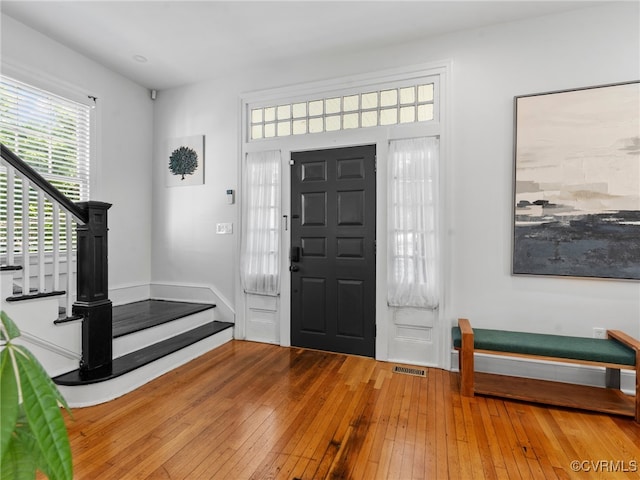 130 N Jefferson St, Petersburg, VA 23803 - foyer with stairway and hardwood / wood-style floors