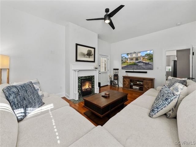 130 N Jefferson St, Petersburg, VA 23803 - living room with a ceiling fan, wood finished floors, and a fireplace with flush hearth