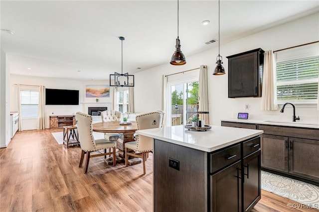 236 Central Pkwy, Aylett, VA 23009 - kitchen with plenty of natural light, light wood-type flooring, light countertops, hanging light fixtures, and recessed lighting