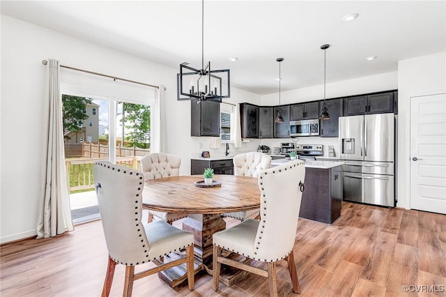 236 Central Pkwy, Aylett, VA 23009 - dining room with light wood-style floors, a chandelier, and recessed lighting