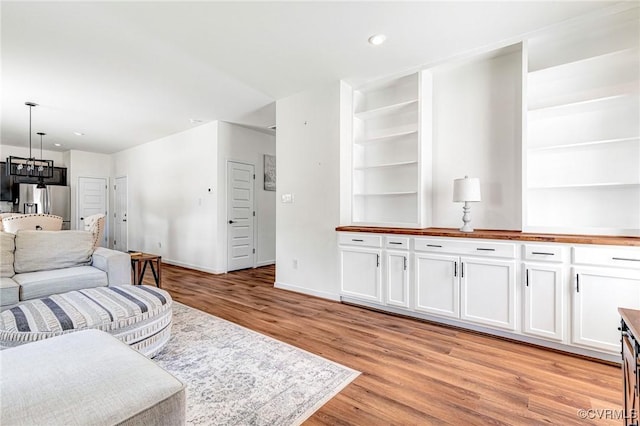 236 Central Pkwy, Aylett, VA 23009 - living area featuring light wood-type flooring, recessed lighting, and a chandelier