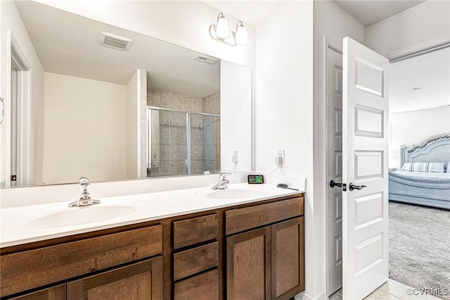 236 Central Pkwy, Aylett, VA 23009 - ensuite bathroom featuring double vanity, a stall shower, and tile patterned flooring