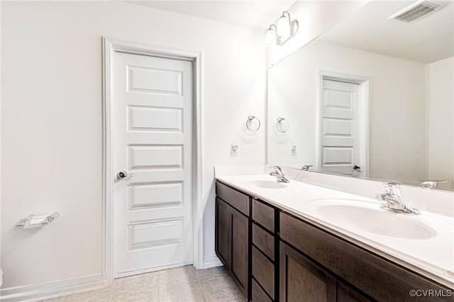 236 Central Pkwy, Aylett, VA 23009 - bathroom featuring double vanity and baseboards