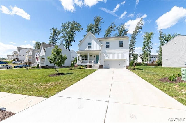 236 Central Pkwy, Aylett, VA 23009 - modern farmhouse style home with covered porch, an attached garage, a residential view, driveway, and a front yard