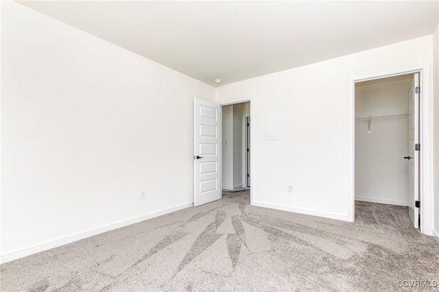 236 Central Pkwy, Aylett, VA 23009 - unfurnished bedroom featuring carpet flooring, a spacious closet, and a closet
