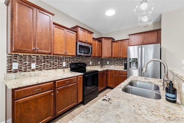 8307 Badestowe Ct, Chesterfield, VA 23832 - kitchen with appliances with stainless steel finishes, tasteful backsplash, light tile patterned floors, light stone counters, and brown cabinetry