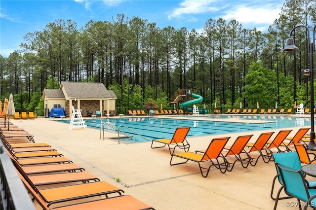 8307 Badestowe Ct, Chesterfield, VA 23832 - community pool featuring a water slide and a patio