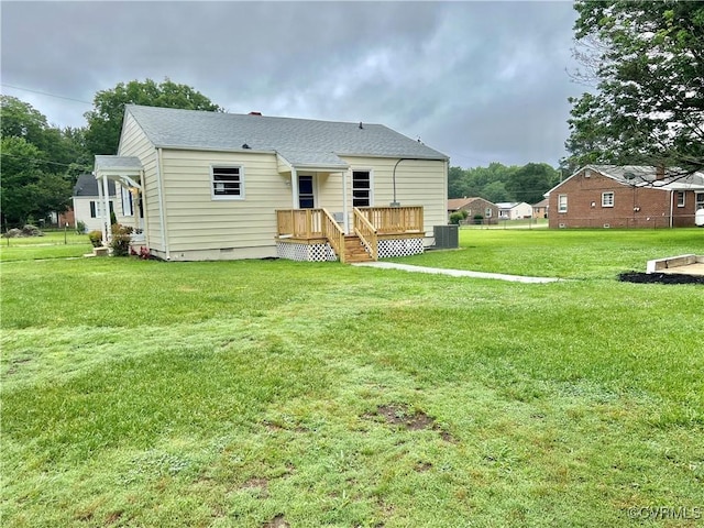 318 Youngs Rd, Petersburg, VA 23803 - back of property featuring a wooden deck, a lawn, crawl space, and a shingled roof