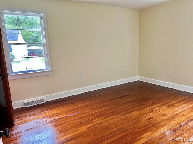 318 Youngs Rd, Petersburg, VA 23803 - empty room with wood-type flooring and baseboards