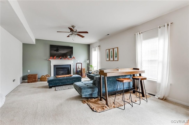 6007 Faulkner Dr, North Chesterfield, VA 23234 - living area featuring a glass covered fireplace, ceiling fan, and carpet flooring