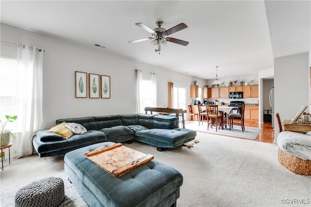 6007 Faulkner Dr, North Chesterfield, VA 23234 - living area with ceiling fan and light carpet