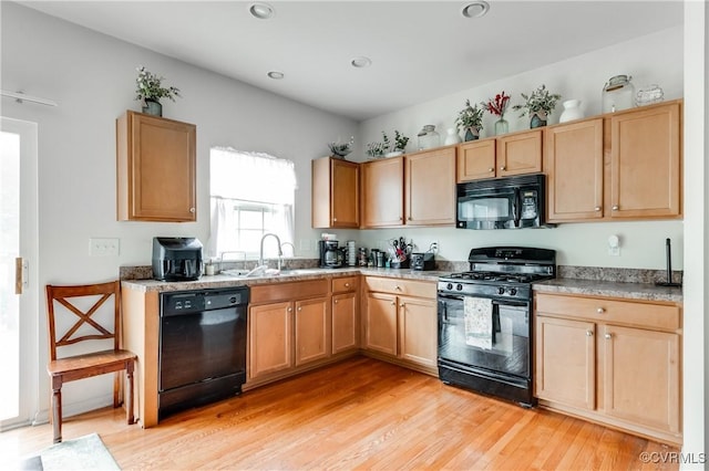 6007 Faulkner Dr, North Chesterfield, VA 23234 - kitchen featuring black appliances, light wood-style floors, recessed lighting, and light brown cabinetry