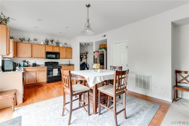 6007 Faulkner Dr, North Chesterfield, VA 23234 - dining space with light wood-style floors