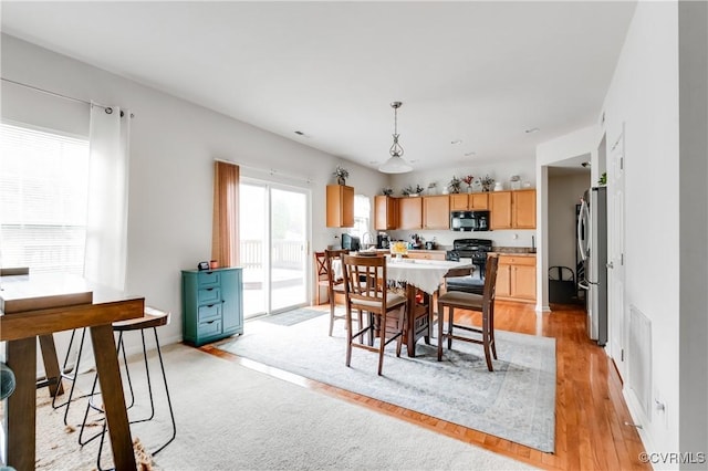 6007 Faulkner Dr, North Chesterfield, VA 23234 - dining space featuring light wood-type flooring