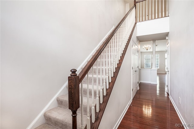 3133 Abruzzo Pl, Glen Allen, VA 23059 - stairs with wood finished floors, a chandelier, and a high ceiling
