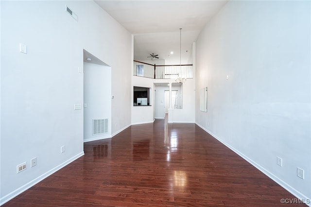 3133 Abruzzo Pl, Glen Allen, VA 23059 - unfurnished living room featuring wood finished floors, a towering ceiling, and ceiling fan