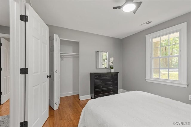3519 Murchies Hill Rd, Richmond, VA 23234 - bedroom with wood finished floors, a closet, and ceiling fan