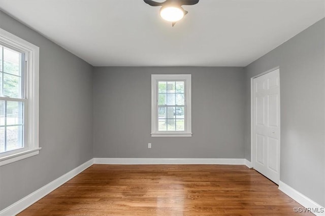 3519 Murchies Hill Rd, Richmond, VA 23234 - spare room with wood finished floors and a ceiling fan
