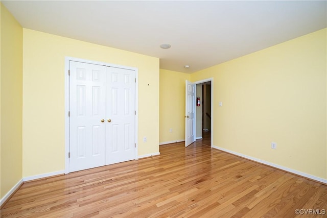 11420 Willows Green Way, Glen Allen, VA 23059 - unfurnished bedroom featuring light wood-style floors and a closet
