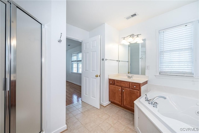 11420 Willows Green Way, Glen Allen, VA 23059 - full bathroom with a bath, vanity, tile patterned flooring, and a shower stall