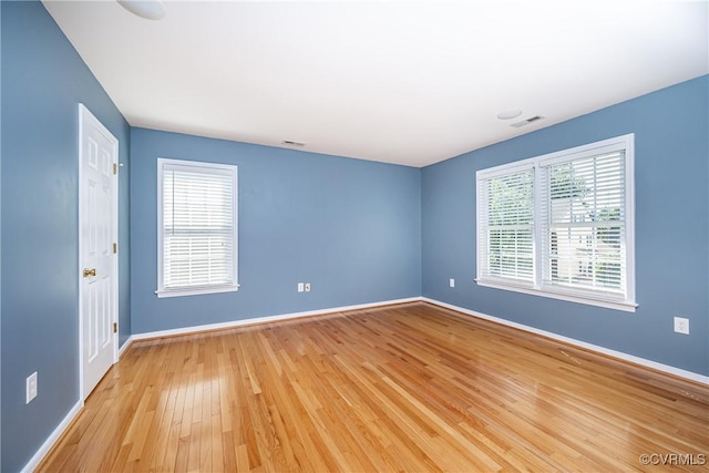 11420 Willows Green Way, Glen Allen, VA 23059 - empty room featuring baseboards and light wood finished floors