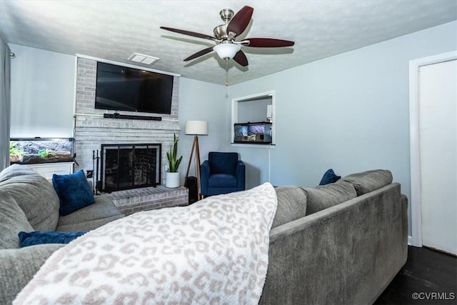 2412 Omega Rd, Henrico, VA 23228 - living room with ceiling fan and a brick fireplace