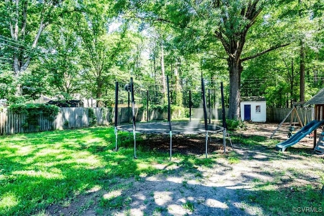 2412 Omega Rd, Henrico, VA 23228 - fenced backyard with a trampoline and a storage shed