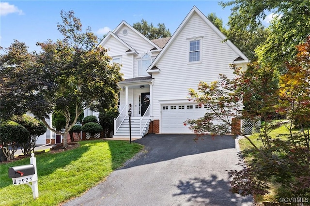 2925 Mariners Pl, Midlothian, VA 23112 - traditional-style home featuring asphalt driveway, a garage, and a front yard