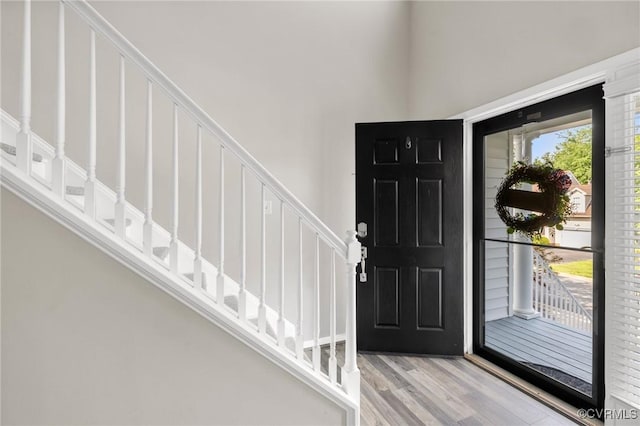 2925 Mariners Pl, Midlothian, VA 23112 - foyer featuring wood finished floors, stairs, and a towering ceiling