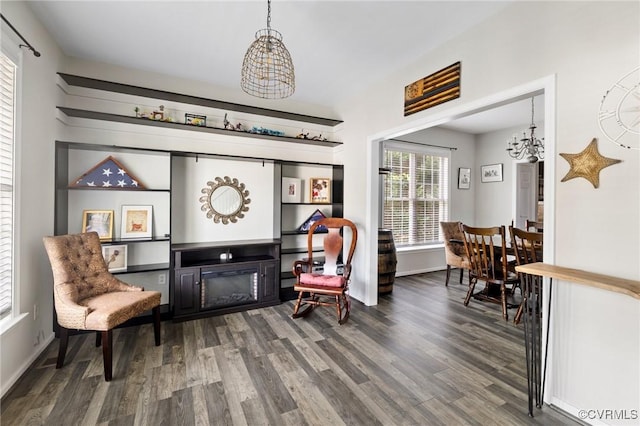 2925 Mariners Pl, Midlothian, VA 23112 - living area featuring a chandelier, wood finished floors, and a glass covered fireplace