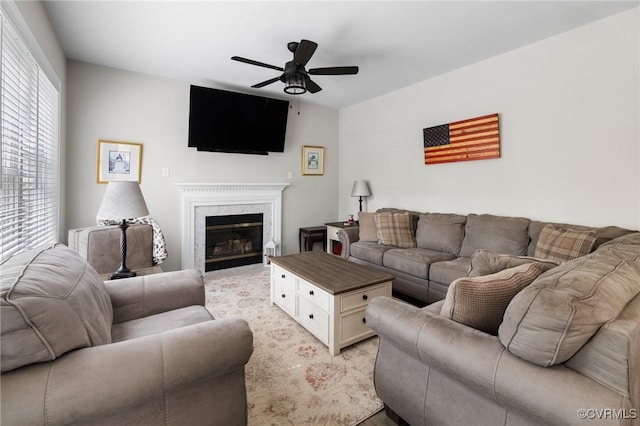 2925 Mariners Pl, Midlothian, VA 23112 - living room with ceiling fan, a glass covered fireplace, and light wood-type flooring