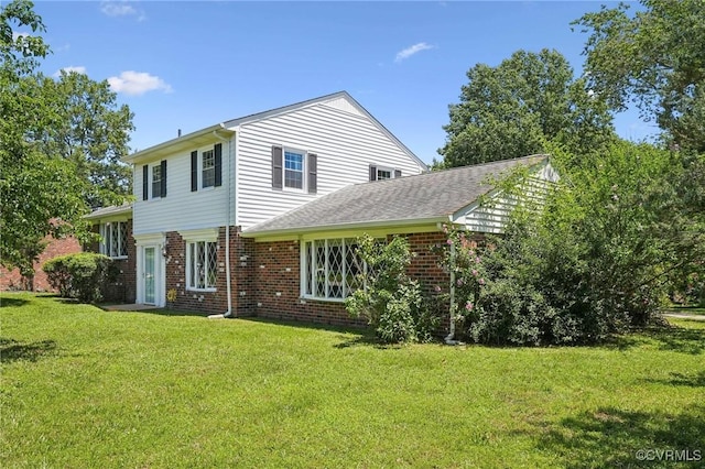 301 Perth Ln, Sandston, VA 23150 - view of front of house featuring brick siding and a front yard