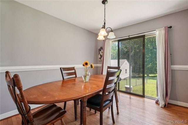 301 Perth Ln, Sandston, VA 23150 - dining space with light wood finished floors and a chandelier