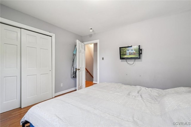 301 Perth Ln, Sandston, VA 23150 - bedroom with wood finished floors and a closet