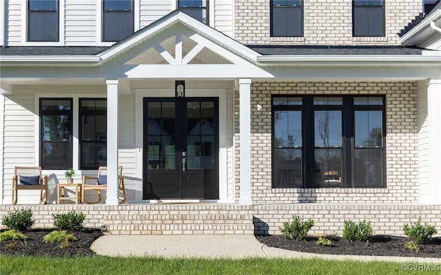 4812 Lake Summer Loop, Moseley, VA 23120 - property entrance featuring covered porch and brick siding