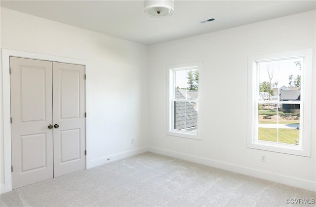 4812 Lake Summer Loop, Moseley, VA 23120 - unfurnished bedroom featuring light carpet and a closet