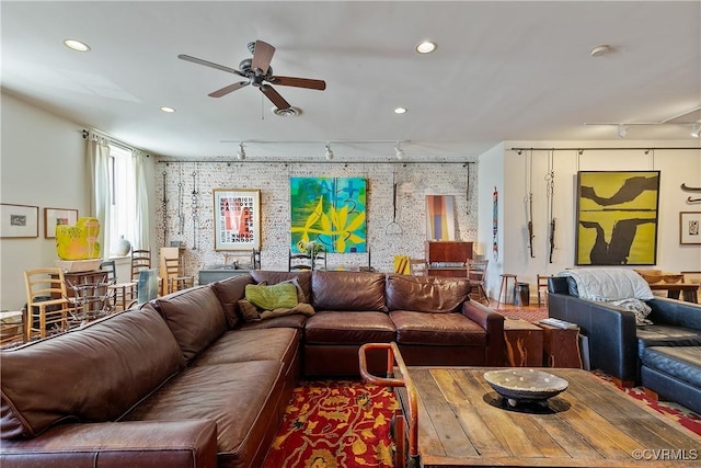 22 N Sycamore St, Petersburg, VA 23803 - living area with a ceiling fan, track lighting, recessed lighting, and an accent wall