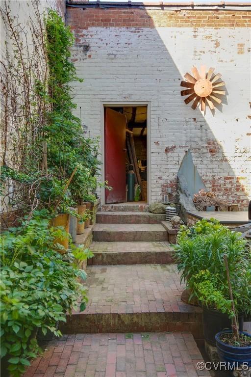 22 N Sycamore St, Petersburg, VA 23803 - entrance to property with brick siding