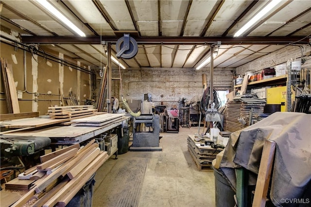 22 N Sycamore St, Petersburg, VA 23803 - garage featuring a workshop area