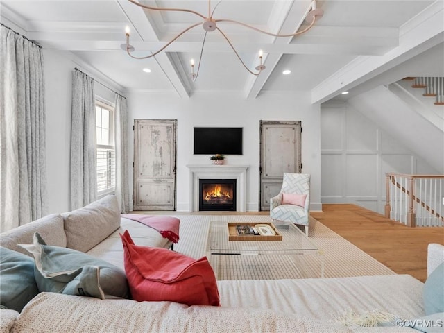 511 Libbie Ave Unit C, Richmond, VA 23226 - living room featuring wood finished floors, beam ceiling, coffered ceiling, a glass covered fireplace, and recessed lighting