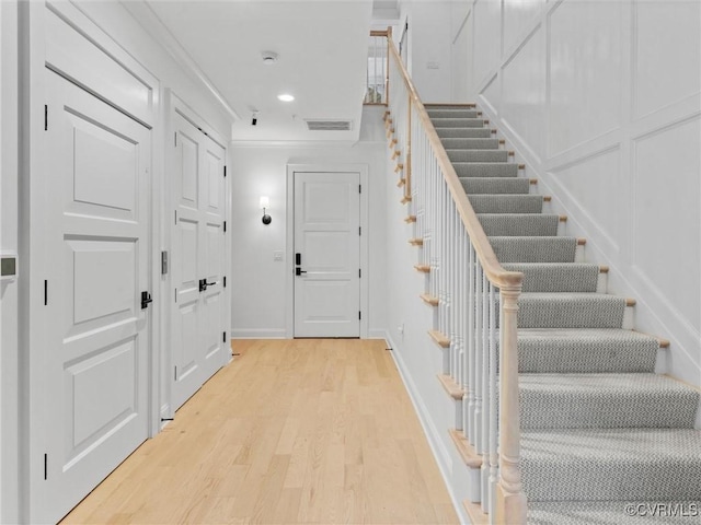 511 Libbie Ave Unit C, Richmond, VA 23226 - stairs with wood finished floors, crown molding, and recessed lighting