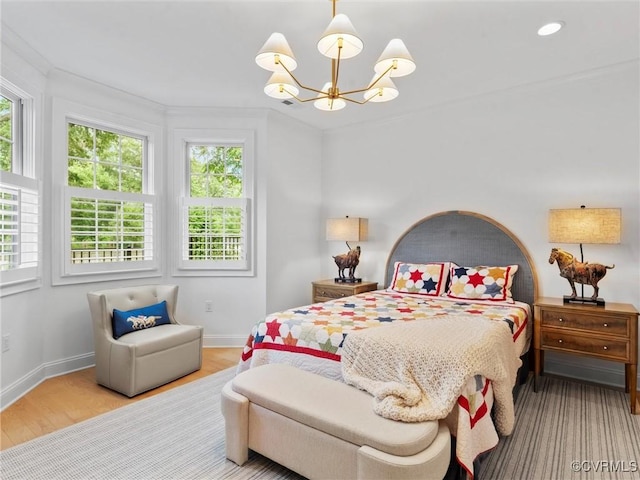 511 Libbie Ave Unit C, Richmond, VA 23226 - bedroom with a chandelier and wood finished floors